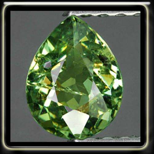 0.62T UNUSUAL ATLANTIS GREEN DEMANTOID GARNET MASTERFULLY CUT IN A PORTUGUESE PEAR GEMSTONE