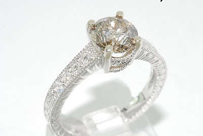R100000 - OUT OF THIS WORLD 1.52CT 9 STONE COGNAC DIAMOND ENGAGEMENT RING
