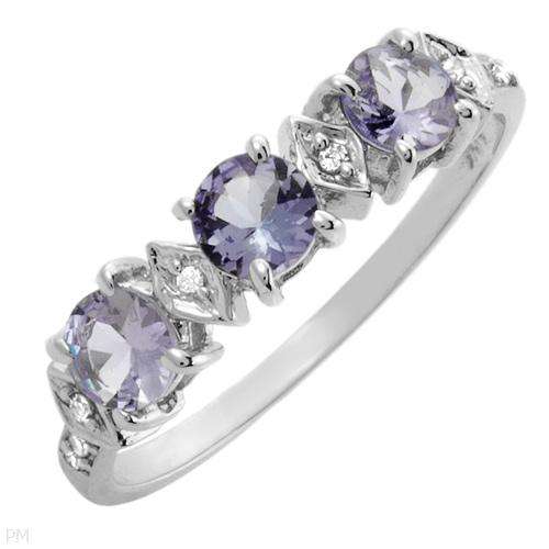 R12500 - ELEGANT TANZANITE AND DIAMOND 0.92CT 3 STONE PLUS RING