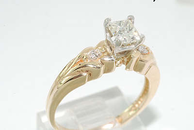 R45000 - DAZZLING .73CT PRINCESS CUT DIAMOND ENGAGEMENT RING