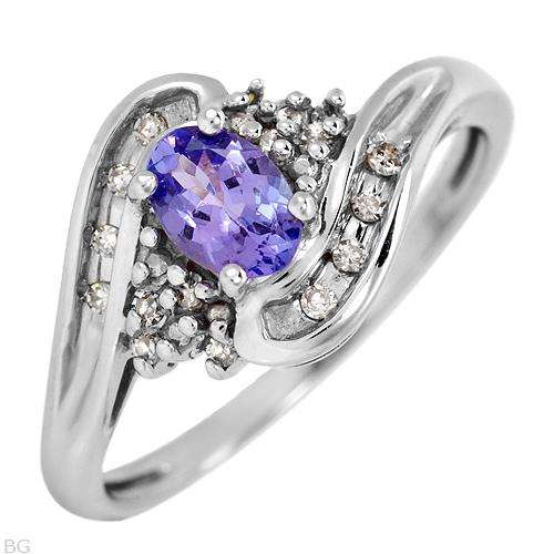 R25000 - MAJESTIC TANZANITE AND CLEAN DIAMOND RING