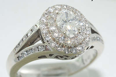 R100000 EXQUISITE 1.27CT OVAL CUT DIAMOND ENGAGEMENT RING VS