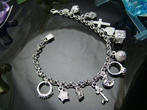 ***PRETTY*** sterling silver charm bracelet - 13 charms ***PERFECT GIFT***