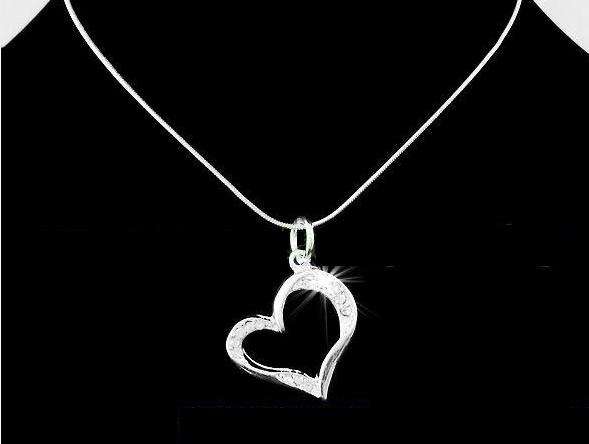 ***UNUSUAL***  sterling silver chain with heart pendant