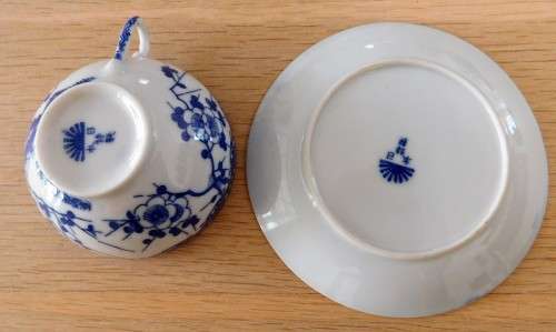 Oriental blue and white eggshell cup and saucer