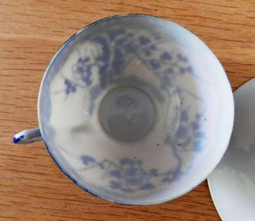 Oriental blue and white eggshell cup and saucer