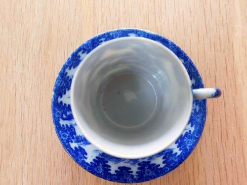 Oriental blue and white eggshell espresso cup and saucer