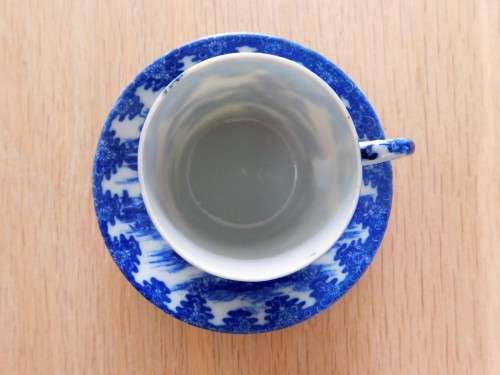 Oriental blue and white eggshell espresso cup and saucer