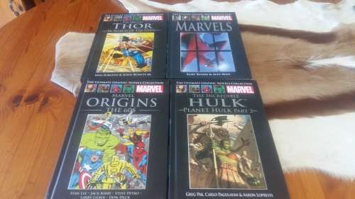4 BRAND NEW MARVELS HARDCOVER COMIC BOOKS