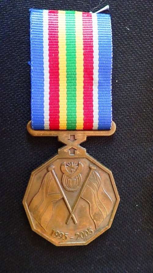 South African Police 10 year commemoration medal numbered