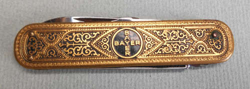 Vintage Bayer brass and enamel pocket knife by J. Bierhoff made in Solingen, Germany.