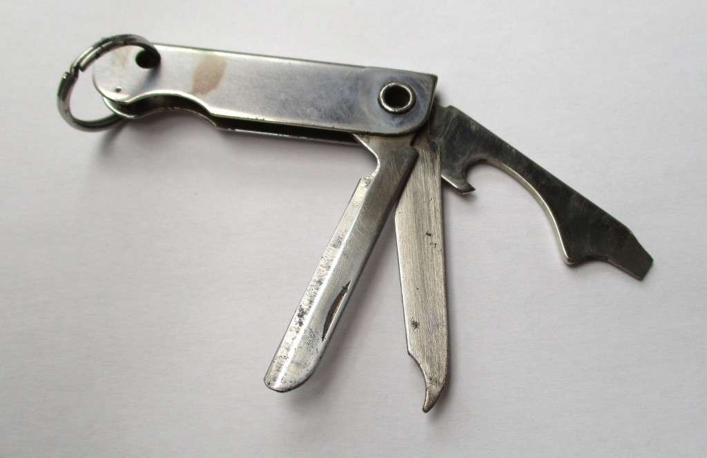 Vintage USA key chain multitool / knife / bottle opener / nail file -- Made by Bassett, USA , 79