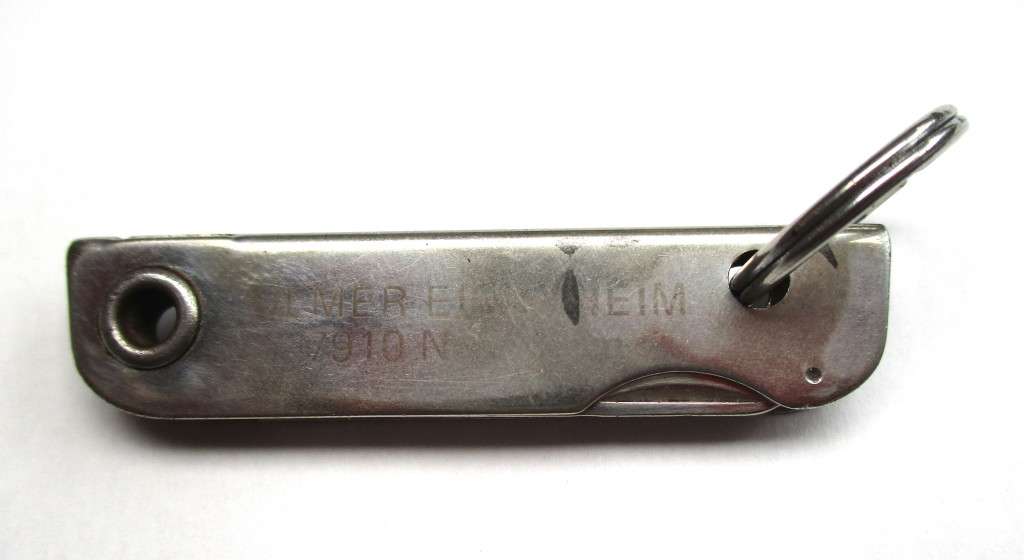 Vintage USA key chain multitool / knife / bottle opener / nail file -- Made by Bassett, USA , 79