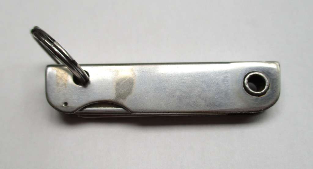 Vintage USA key chain multitool / knife / bottle opener / nail file -- Made by Bassett, USA , 79