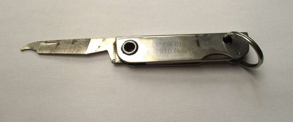 Vintage USA key chain multitool / knife / bottle opener / nail file -- Made by Bassett, USA , 79