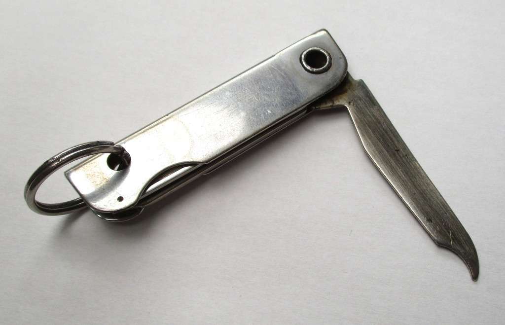 Vintage USA key chain multitool / knife / bottle opener / nail file -- Made by Bassett, USA , 79