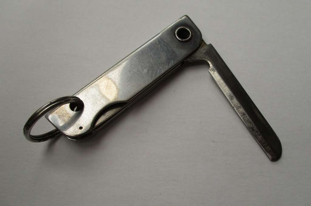 Vintage USA key chain multitool / knife / bottle opener / nail file -- Made by Bassett, USA , 79