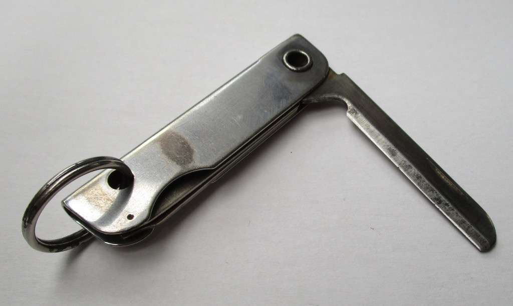 Vintage USA key chain multitool / knife / bottle opener / nail file -- Made by Bassett, USA , 79