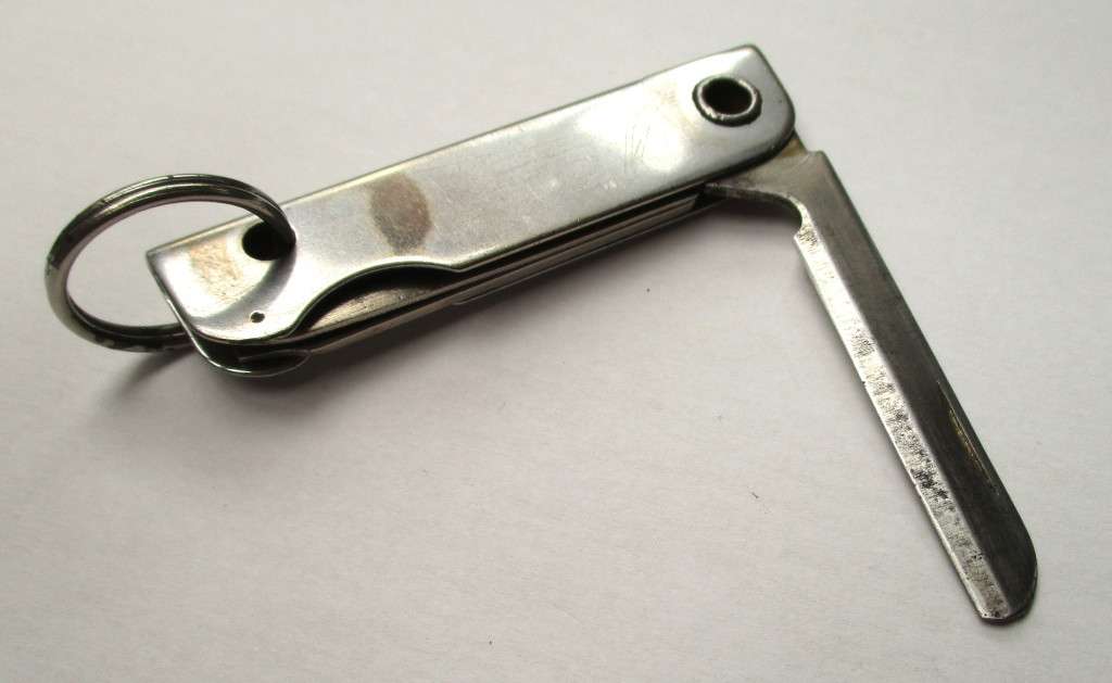 Vintage USA key chain multitool / knife / bottle opener / nail file -- Made by Bassett, USA , 79