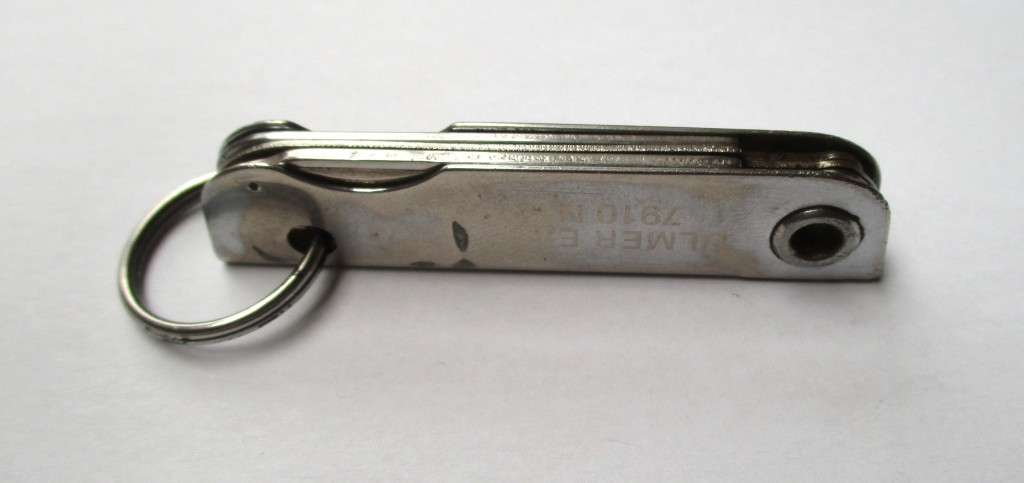 Vintage USA key chain multitool / knife / bottle opener / nail file -- Made by Bassett, USA , 79
