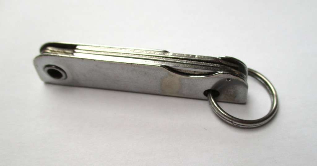 Vintage USA key chain multitool / knife / bottle opener / nail file -- Made by Bassett, USA , 79