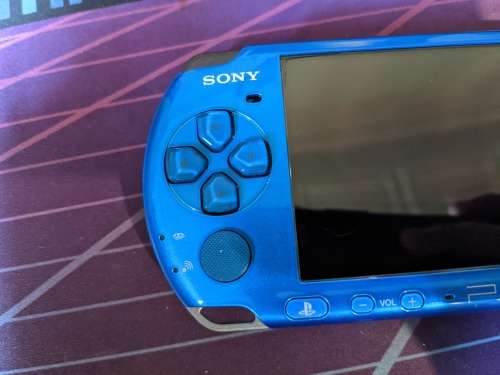 Blue PSP 3000 / Slim with 4GB Memory card and one game