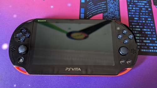PS Vita Slim (2000) Red and Black with 3 games, 8GB Vita Memory card