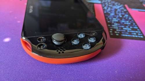 PS Vita Slim (2000) Red and Black with 3 games, 8GB Vita Memory card