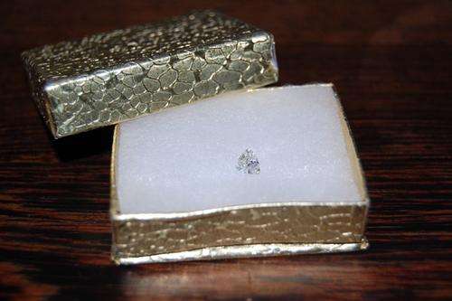 Genuine 0.57ct Trilliant Diamond