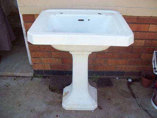 VERY OLD CAST IRON WASH BASIN ON PEDESTAL
