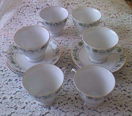 6 FOOTED CUPS AND SAUCERS, AS NEW