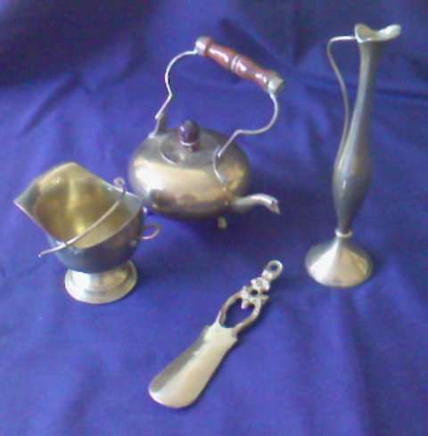 4 BRASS ORNAMENTS