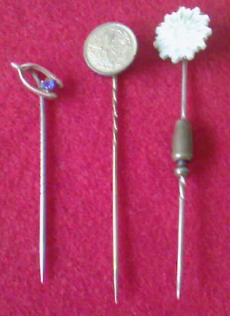 3 ANTIQUE TIEPINS, ONE WITH 1911 'KONINGRIJK DER NEDERLANDEN' 1/2 CENT COIN