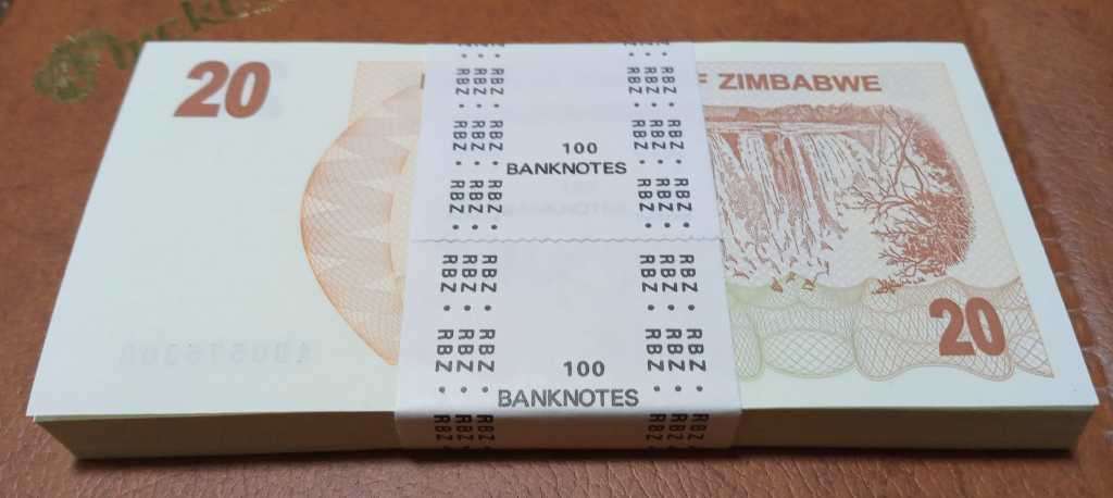 2006 Zimbabwe stack 100x Twenty Dollars bills in RBZ seal. Crisp UNC