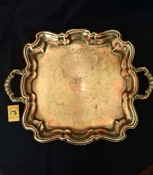 large emess silverplate on copper tray on bun feet