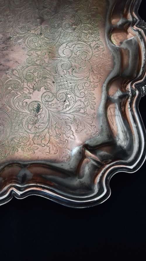 large emess silverplate on copper tray on bun feet