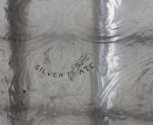 large emess silverplate on copper tray on bun feet