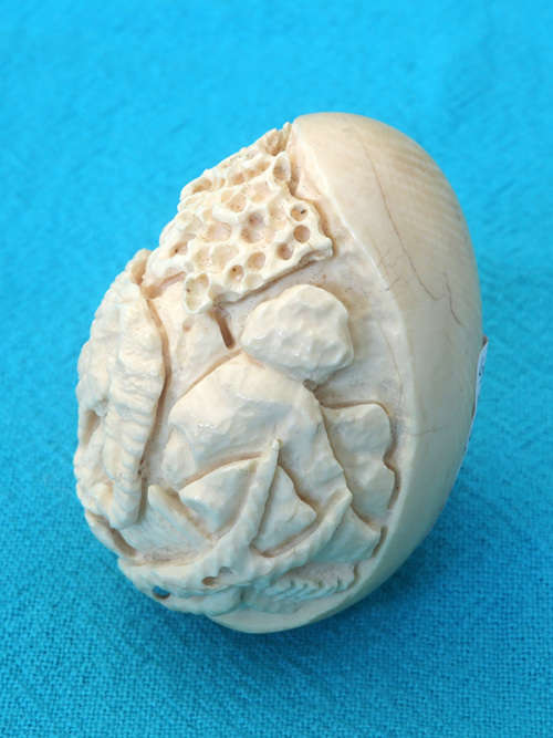 vintage ivory carved egg  with elephant