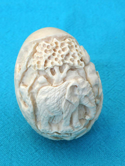 vintage ivory carved egg  with elephant