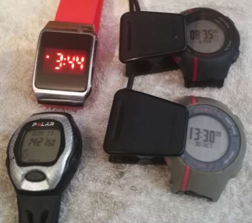 2 x Garmin Forerunner Watches x 1 Polar Watch