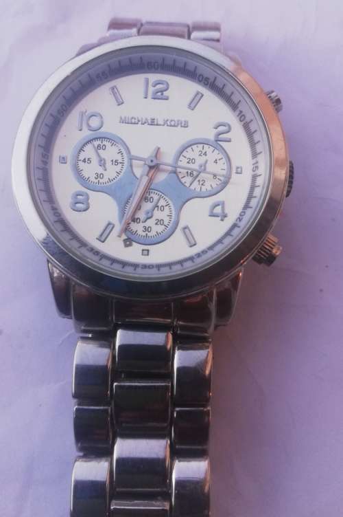 Smartwatch mk price on sale