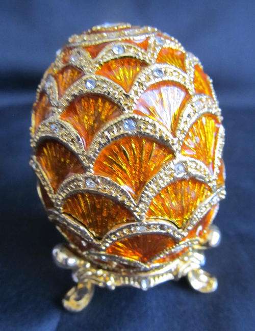 GOLDEN FABERGE EGG ON A STAND with Austrian Gemstones.