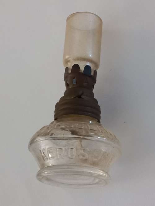 small antique kerosene lamp and glass holder