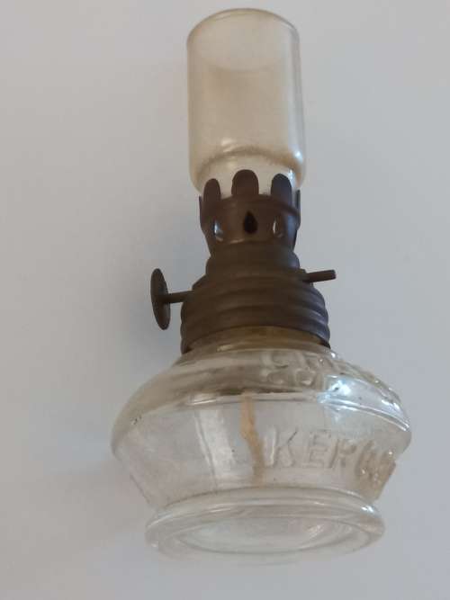 small antique kerosene lamp and glass holder