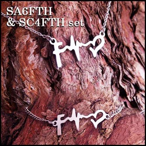 SparklingThings * Gorgeous Stainless Steel Faith Love Hope pendant and matching bracelet set.