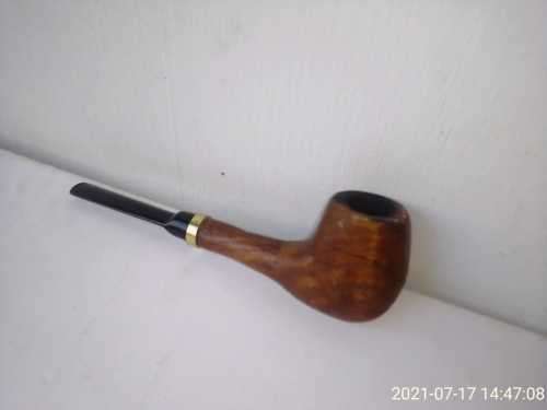 Tobacco hand made genuine wood pipe.