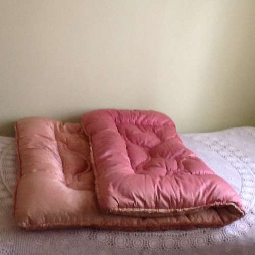A Lovely Vintage Pink Feather Eiderdown for a Single Bed.