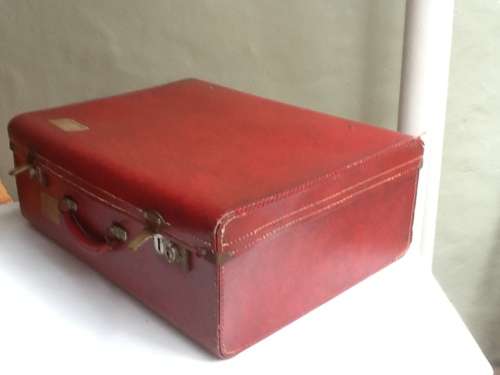 A Vintage Red Suitcase.