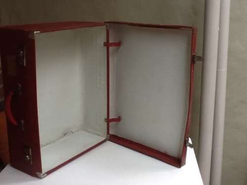 A Vintage Red Suitcase.