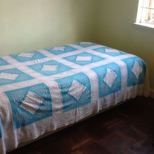 A Lovely Vintage Embroidered Tablecloth with 8 Servettes.  Length 230cm.  Width : 145cm.